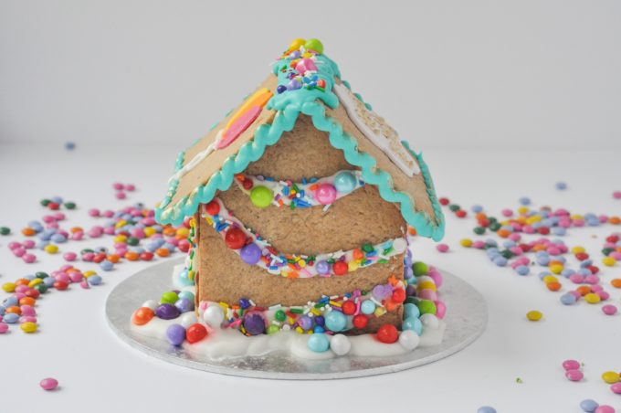 Back of birthday gingerbread cottage with colourful garlands