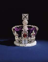 A picture of the crown jewels silver crown with purple base