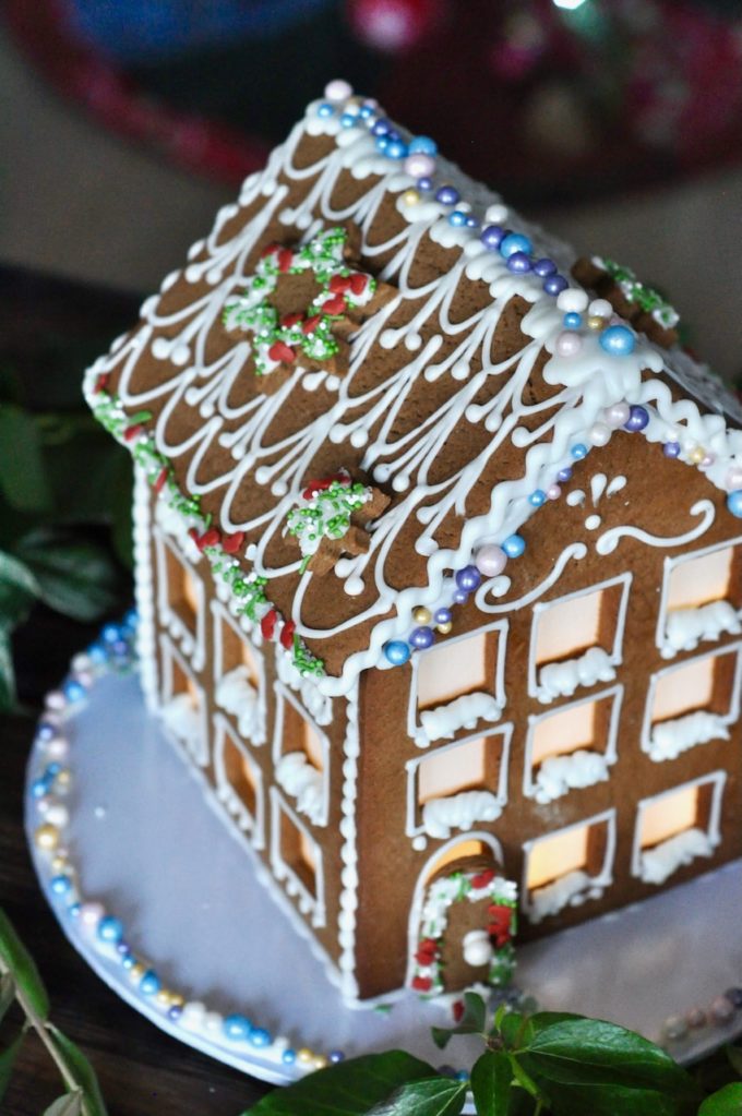 Vegan gingerbread house roof with green and red decorations