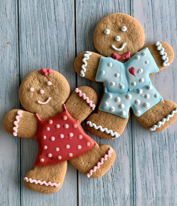 gingerbread people gift set. A boy and girl gingerbread hand iced and finished in pinks, reds and blues